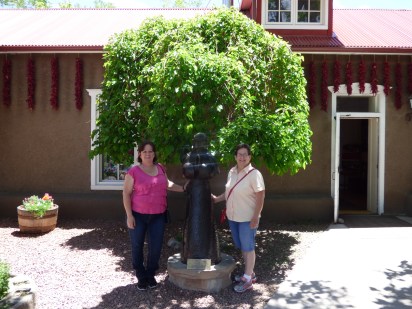 My sister and I outside Rancho de Chimayo.